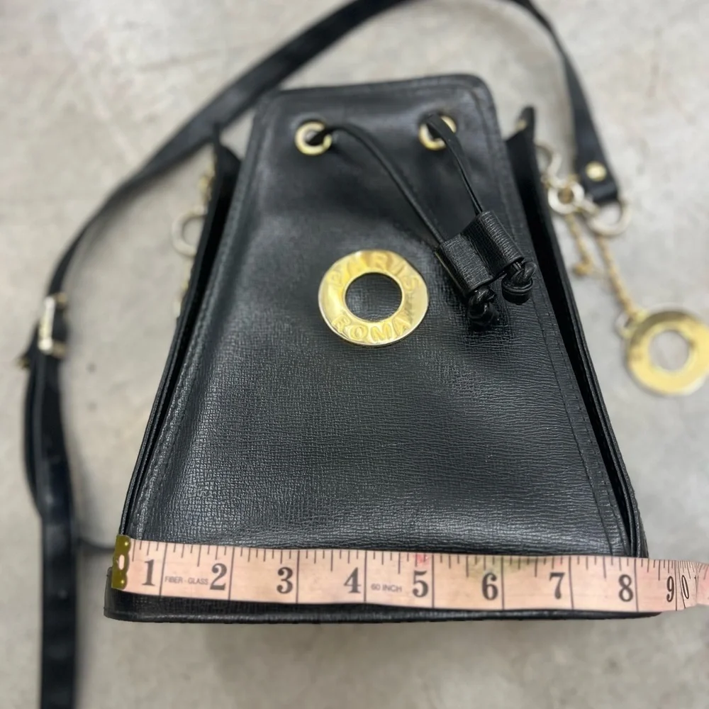 Small Black Crossbody Bag with Gold Accents and Drawstring Closure - Picture 10 of 11